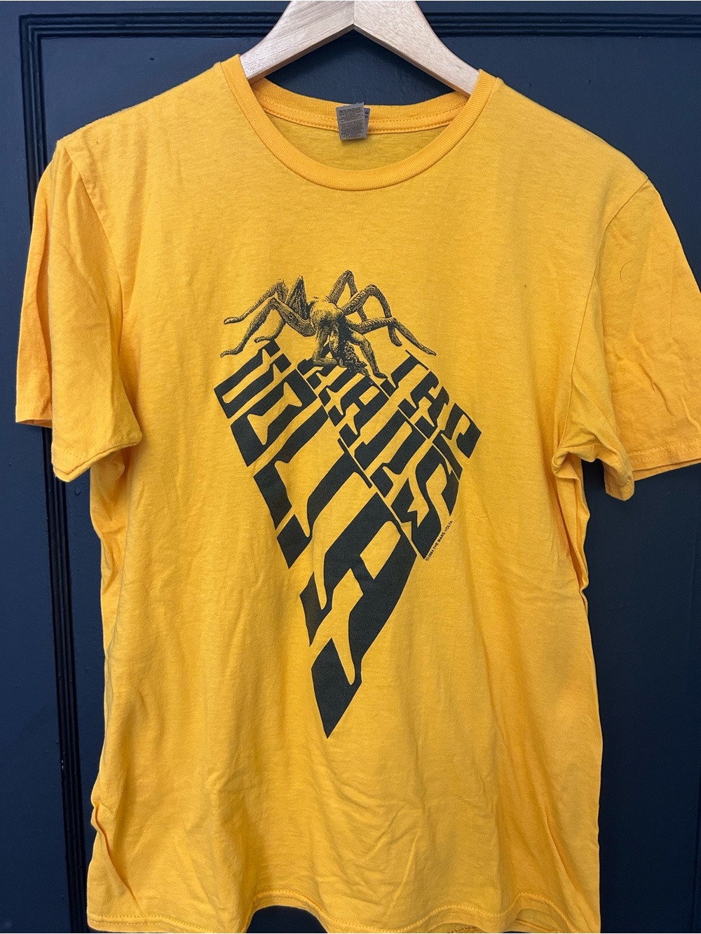 The Mars Volta tour shirt golden yellow